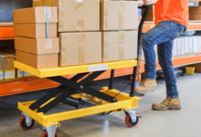 Optimizing Vertical Storage with Scissor Lifts: Elevating Efficiency in Space-Constrained Warehouses